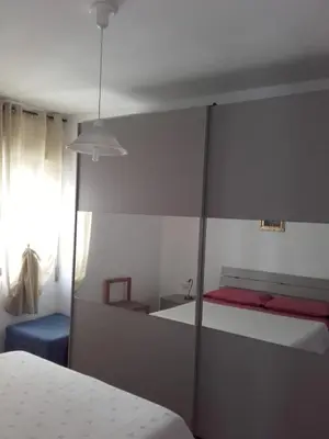 Letto o letti in una camera di Casa Pina