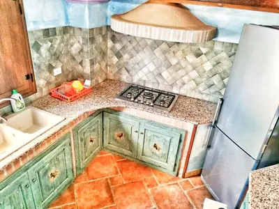 Cucina o angolo cottura di Villa Su Navru