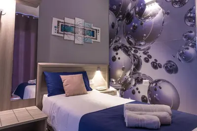 Letto o letti in una camera di La Piazzetta Guest House