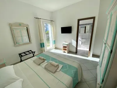 Letto o letti in una camera di Tigrillo Bed&Breakfast