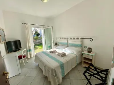 Letto o letti in una camera di Tigrillo Bed&Breakfast