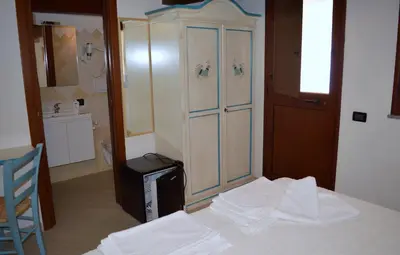 Letto o letti in una camera di B&B Feronia