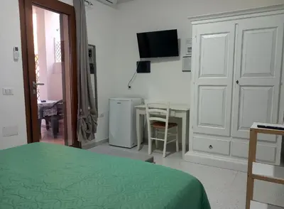 Letto o letti in una camera di B&B Feronia