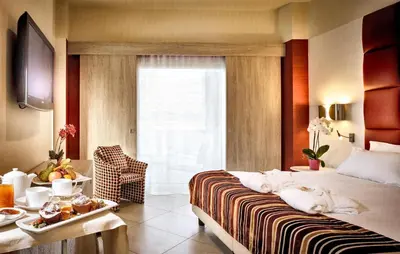 Letto o letti in una camera di Jazz Hotel