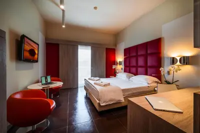 Letto o letti in una camera di Jazz Hotel
