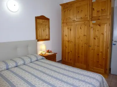 Letto o letti in una camera di Casa Gemma