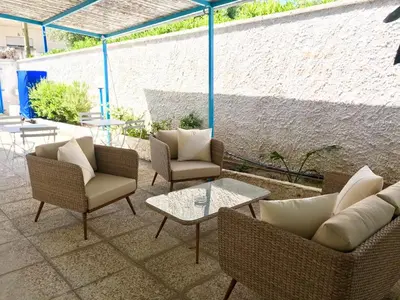 Area soggiorno di PALMASERA CHARMING - Rooms & Suites