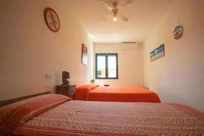 Letto o letti in una camera di Il Pepe Rosa