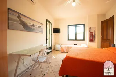 Letto o letti in una camera di Il Pepe Rosa