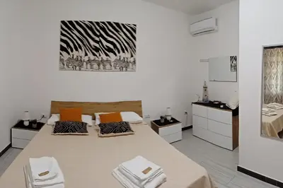 Letto o letti in una camera di La Rosa dei Venti