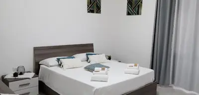 Letto o letti in una camera di La Rosa dei Venti