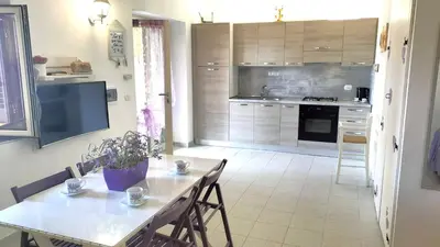 Cucina o angolo cottura di BUDONI MARE, Parcheggio e WIFI gratis
