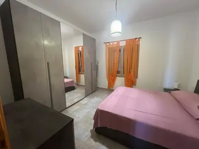 Letto o letti in una camera di Villa Maccioni