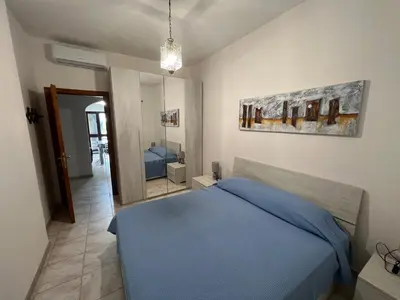 Letto o letti in una camera di Villa Maccioni