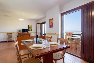 TV o dispositivi per l'intrattenimento presso Appartamenti Spiaggia Bianca