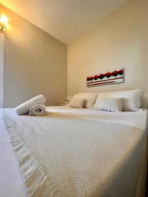 Letto o letti in una camera di Prestige Panoramico Veronese