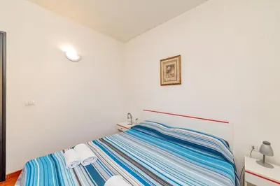 Letto o letti in una camera di Residence Arcobaleno