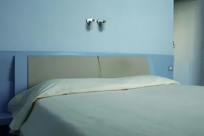 Letto o letti in una camera di La Casa di Boz B&B