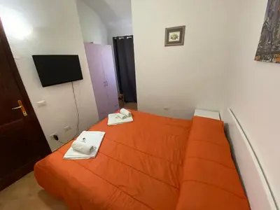 Letto o letti in una camera di La Coccinella al mare