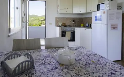Cucina o angolo cottura di Sardegna - Villa Mirto & Flowers