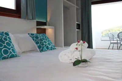 Letto o letti in una camera di I Ginepri Hotel