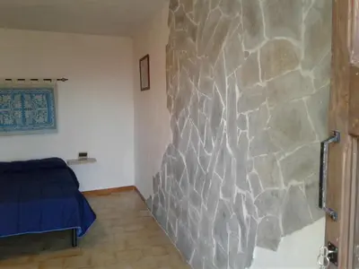 Letto o letti in una camera di B&b barbaricino iun F1442