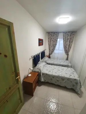 Letto o letti in una camera di Yellowhouse
