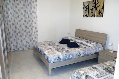 Letto o letti in una camera di Yellowhouse