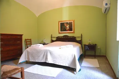 Letto o letti in una camera di B&B Oasi Tepilora
