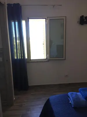 Letto o letti in una camera di La Maison di Zia Annina Olbia