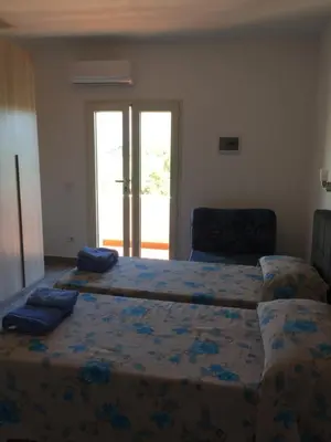 Letto o letti in una camera di La Maison di Zia Annina Olbia