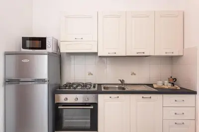Cucina o angolo cottura di Residenze Gallura