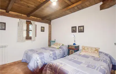 Letto o letti in una camera di Villa Antonietta