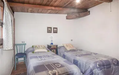 Letto o letti in una camera di Villa Antonietta