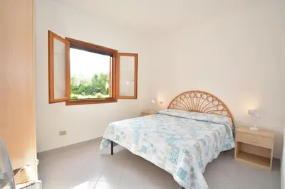 Letto o letti in una camera di Appartamento Coclearia