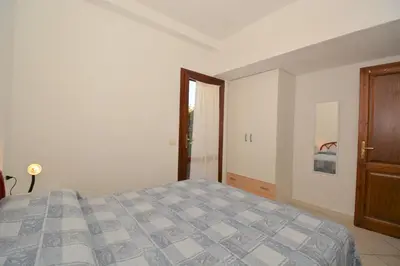 Letto o letti in una camera di Appartamenti Airone