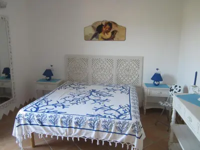 Letto o letti in una camera di Villino Belvedere