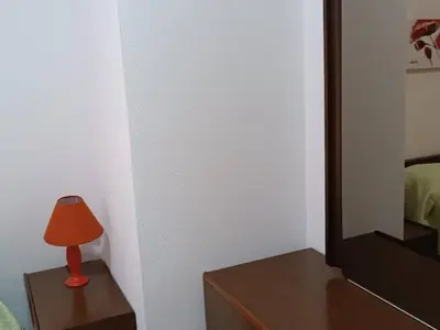 Letto o letti in una camera di Sa domo manna