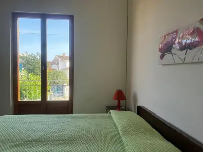 Letto o letti in una camera di Sa domo manna