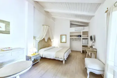 Letto o letti in una camera di Cento Ulivi B&B