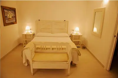Letto o letti in una camera di Cento Ulivi B&B