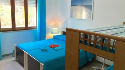 Letto o letti in una camera di Family holiday house by the sea