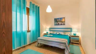 Letto o letti in una camera di Family holiday house by the sea