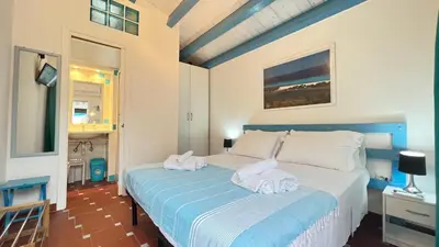 Letto o letti in una camera di Sweet home Santa Lucia