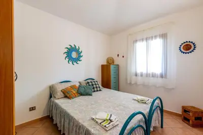 Letto o letti in una camera di Villetta San Teodoro