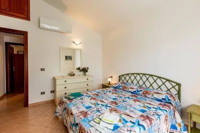 Letto o letti in una camera di Villetta San Teodoro