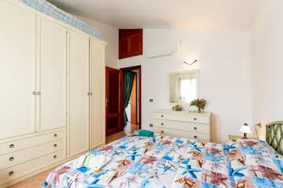 Letto o letti in una camera di Villetta San Teodoro