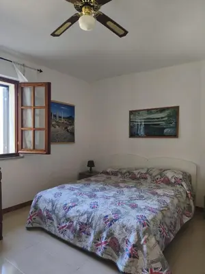Letto o letti in una camera di Villa vista mare