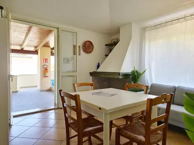 Area soggiorno di Villa Scogliera - Appartamenti con veranda a circa 700 mt dalla spiaggia di Fuile e Mare