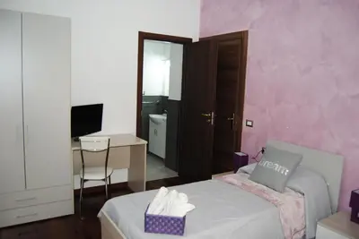 Letto o letti in una camera di B&B Kenzia